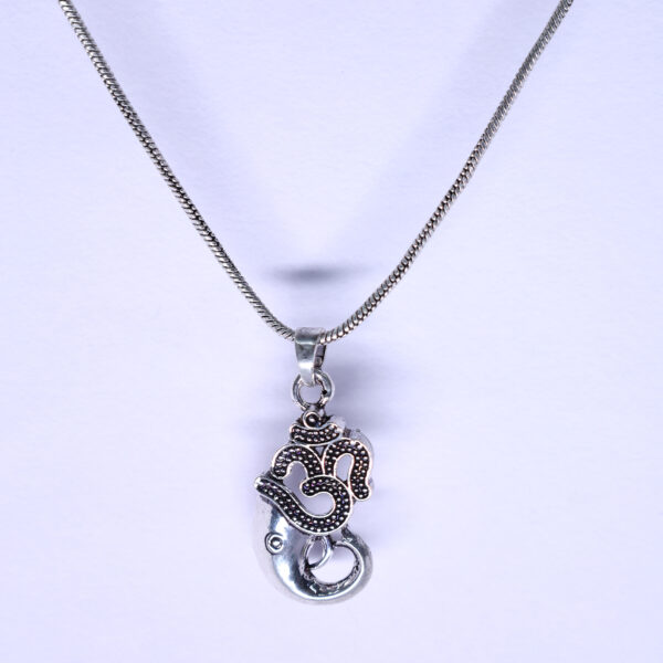 "Om Ganesha pendant with a chain, displayed against a white background. The pendant features the symbol of 'Om' combined with the image of Lord Ganesha, with the white backdrop highlighting its intricate design and craftsmanship."