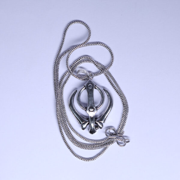 "Khanda pendant with a chain, displayed against a white background. The pendant features the traditional Khanda symbol, with its intricate design standing out clearly against the clean, white backdrop."