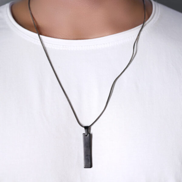 "Elevate your style with this sleek black bar pendant on a delicate chain—perfect for any occasion!"






